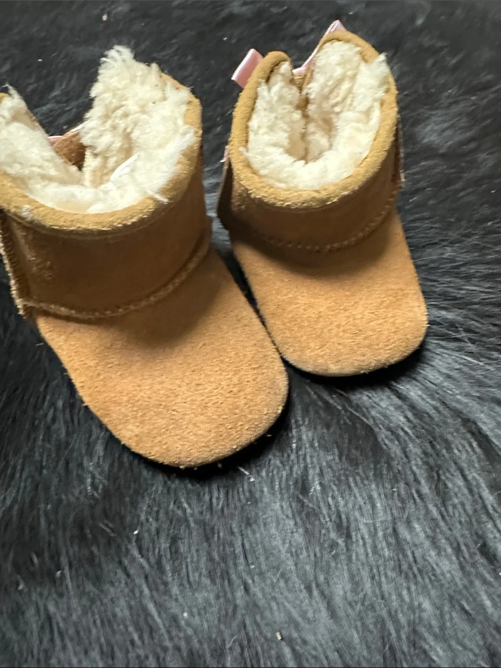 UGG Kids Chestnut Sheepskin Moccasins with Pink Bows